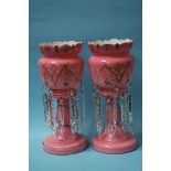 A pair of Victorian pink glass lustres with clear