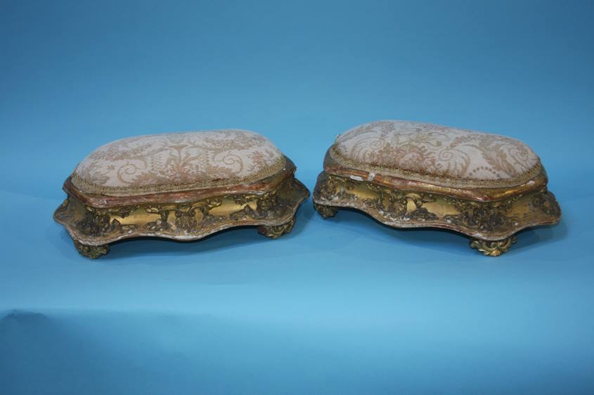 A good pair of late 19th Century giltwood footstoo
