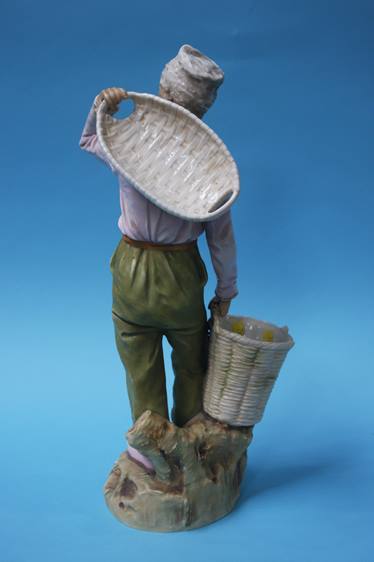 A Royal Dux figure of a boy holding two baskets, p - Image 3 of 4