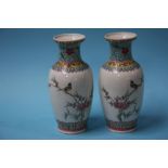 A small pair of Chinese vases and a figure on hors