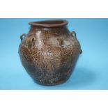 A large stoneware globular vessel decorated with d