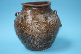 A large stoneware globular vessel decorated with d