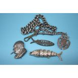 A silver watch chain, an articulated fish and a Wi