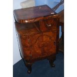 A pair of Art Deco walnut bedside cabinets, 44cm w