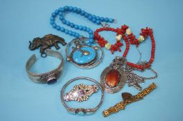 Assorted jewellery, silver bangles and coral neckl
