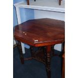 An octagonal occasional table
