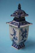 A Chinese blue and white vase and cover decorated