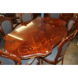 An Italian style marquetry table and six chairs (4+2)