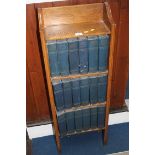 Oak bookcase and eighteen volumes of Charles Dicke