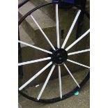 A large cast iron wagon wheel