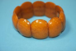 An amber coloured bracelet