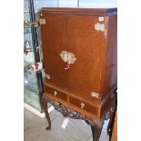 A walnut drinks cabinet