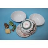 Four Oriental bowls, three scent bottles and a fig