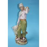 A Royal Dux figure of a boy holding two baskets, p