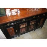 An ebonised mahogany sideboard, 166cm