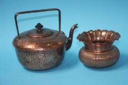 A copper kettle and a flared copper vase, stamped