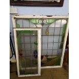 Two framed leaded glass windows