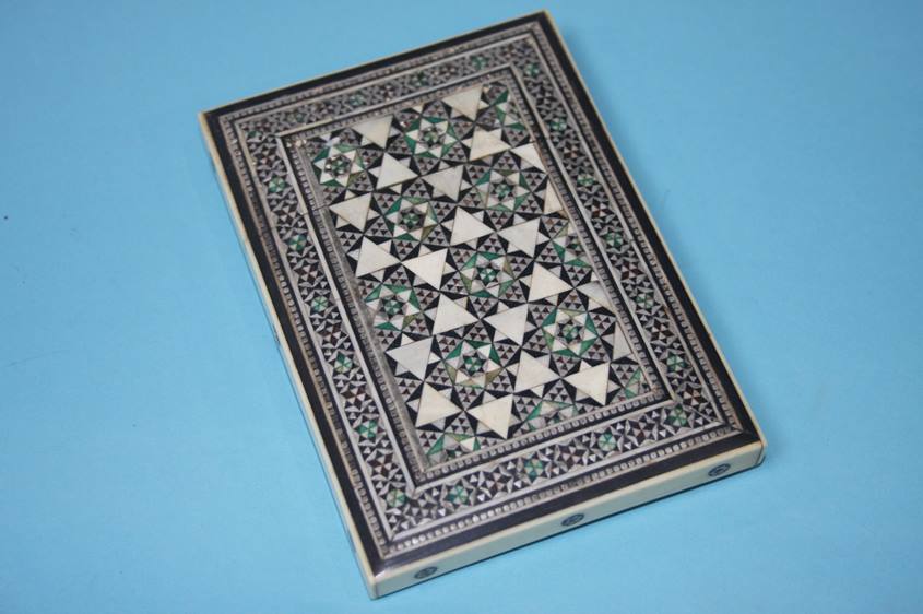 A Middle Eastern bone card case