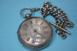 A silver pocket watch and chain