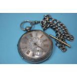 A silver pocket watch and chain