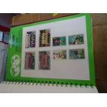 Quantity of World Cup stamps and albums