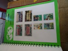 Quantity of World Cup stamps and albums