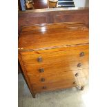 An oak straight front chest of four drawers