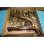 Horse brasses and reproduction flintlock pistols