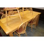 Extending kitchen table and six chairs