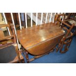 Oak gateleg table and four chairs