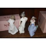 Three boxed Nao figures