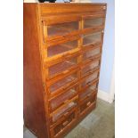 A haberdashery chest of 14 drawers (some woodworm)