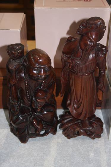 Two rootmen figures