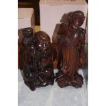 Two rootmen figures