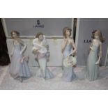 Four boxed Lladro figures