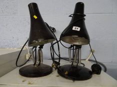 Two angle poise lamps