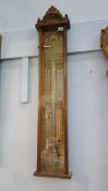 A carved oak Admiral Fitzroy's barometer. 110cm long