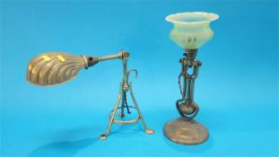 Two angle poise brass lamps.