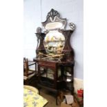 An Edwardian mahogany mirror back display cabinet.