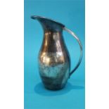 A Mexican sterling silver water jug, stamped 925. Weight 14.8oz/462grams