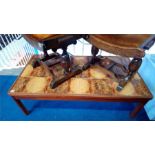 A Danish teak and tiled coffee table.