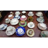 A collection of cabinet cups and saucers including Royal Crown Derby, Aynsley etc.