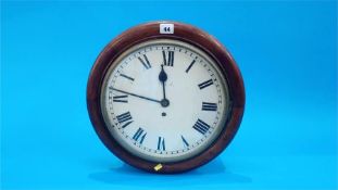 A North Eastern Railway mahogany cased wall clock. Dial 30.5cm diameter