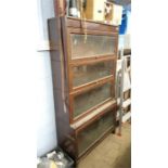 An oak sectional bookcase.