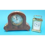 A small carriage clock and an Edwardian mantel clock.