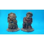 A pair of Victorian cast iron Punch and Judy doorstops.