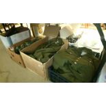 Four boxes of army uniforms.