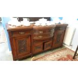 A mahogany bow front sideboard. 181cm