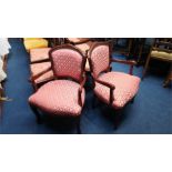 A pair of French style armchairs.
