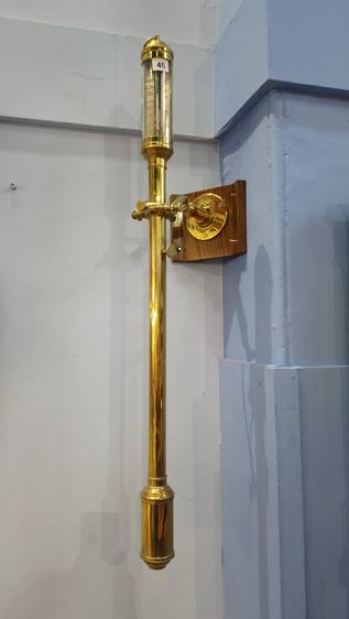 An R.N. Desterro Lisbon brass marine barometer. 94cm high